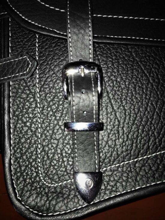 Hold Fast chrome buckles on leather bag Hold Fast chrome buckles on leather bag