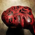 red-tattoo-gloves-hold-fast