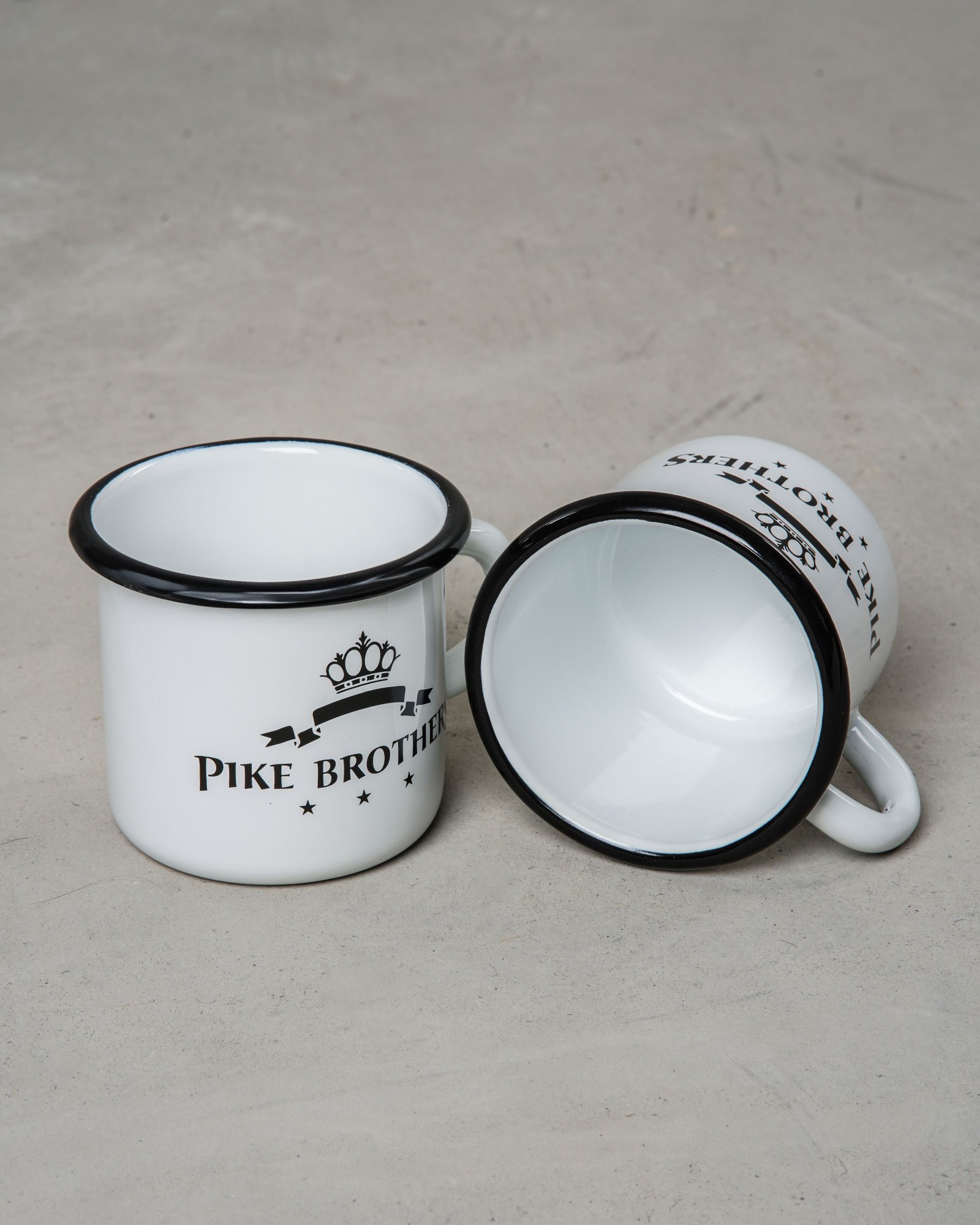 Enamel Mug White Pike Brothers — vintage enamel mug, three-quarter view