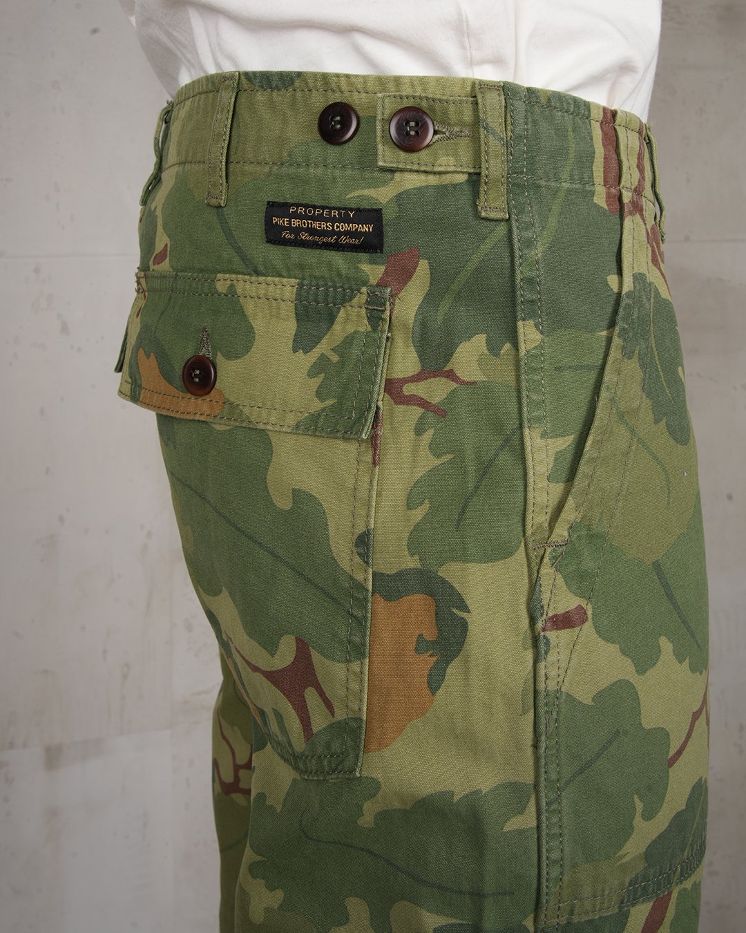 Og-107 Short Mitchell Green Pike Brothers — short vintage, détail de la matière