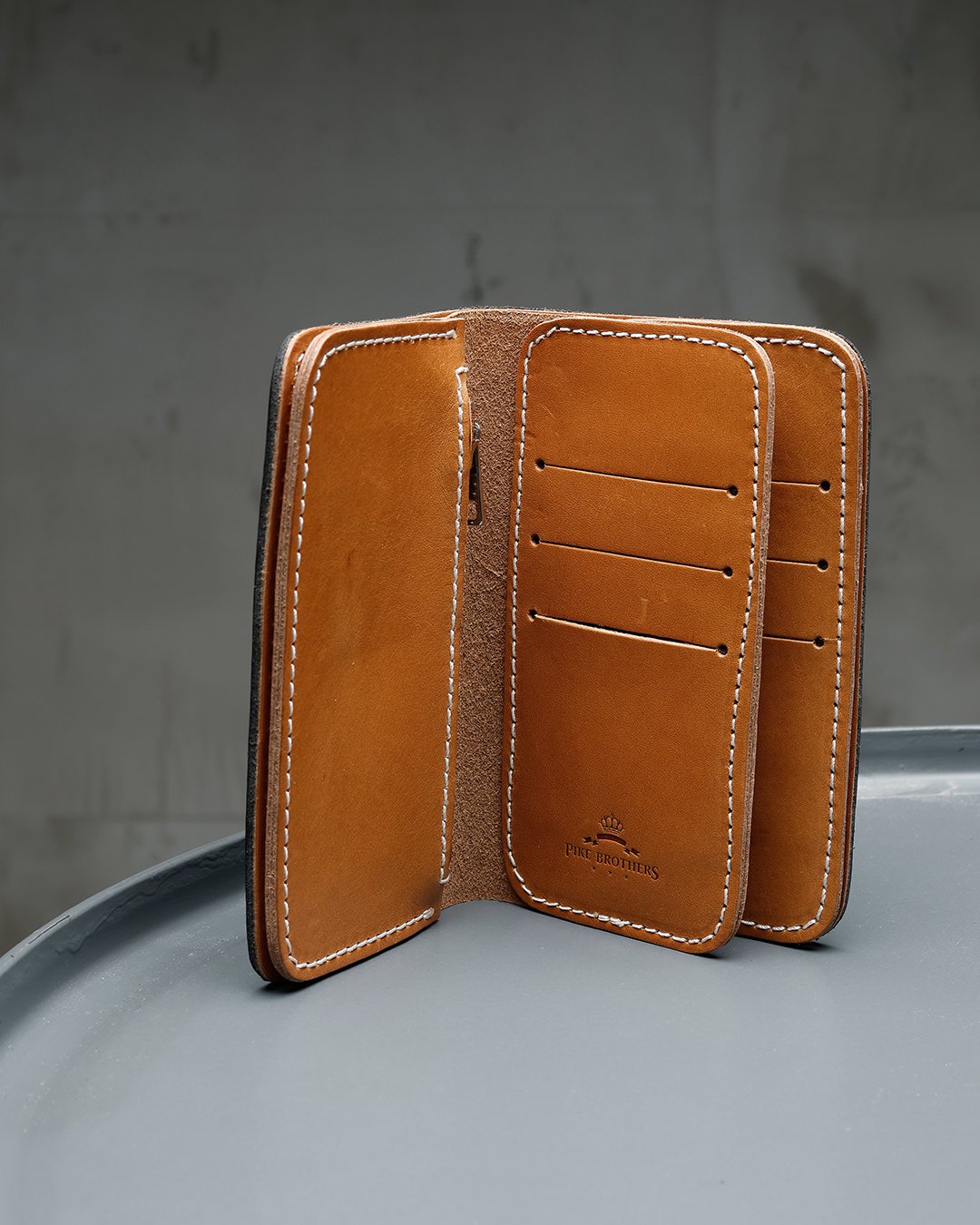 Rider Wallet Seal Black Pike Brothers — vintage wallet, in use